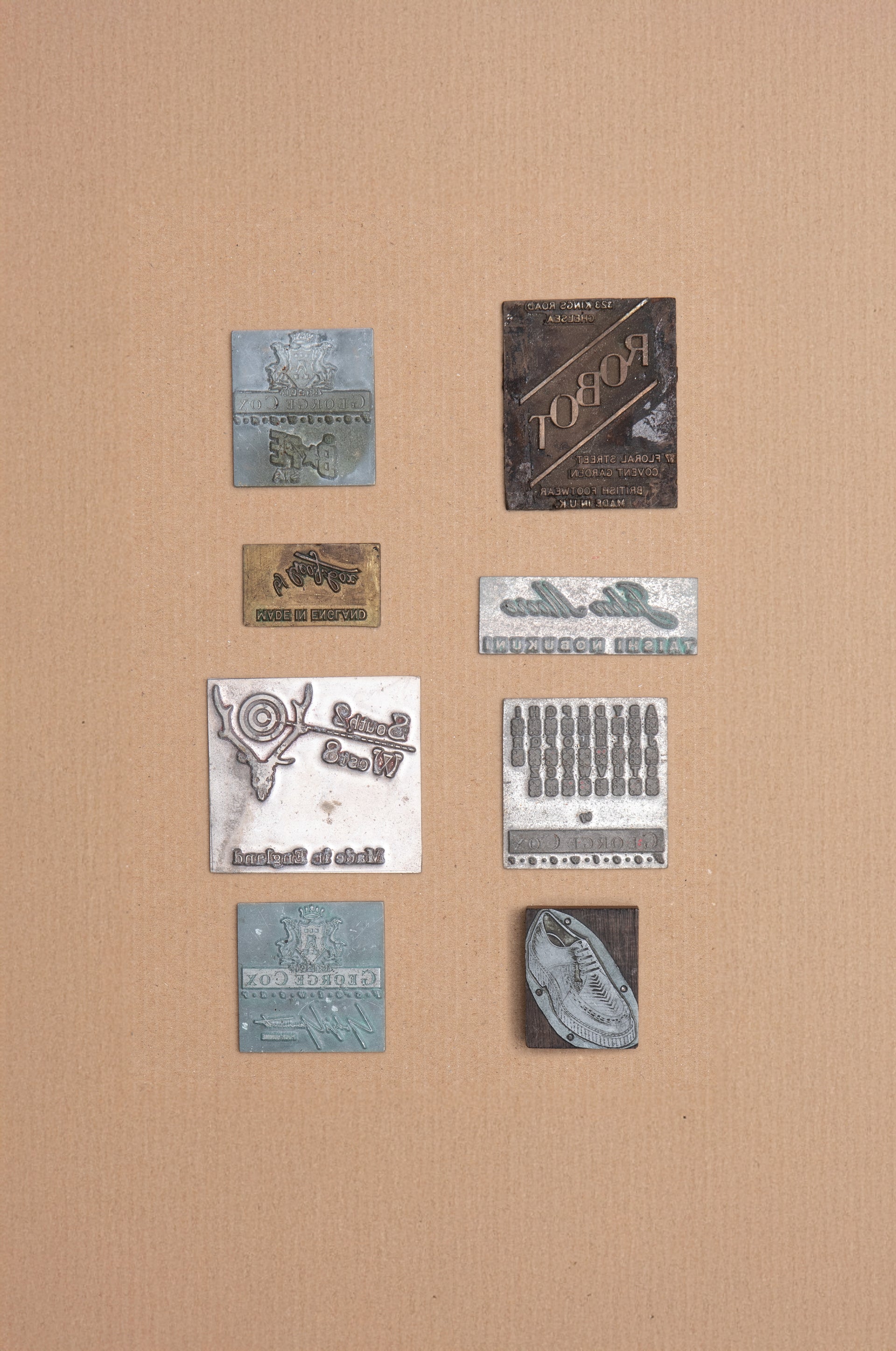 <p><strong>Assorted sock stamps and box end labels, 1954–2002</strong></p>