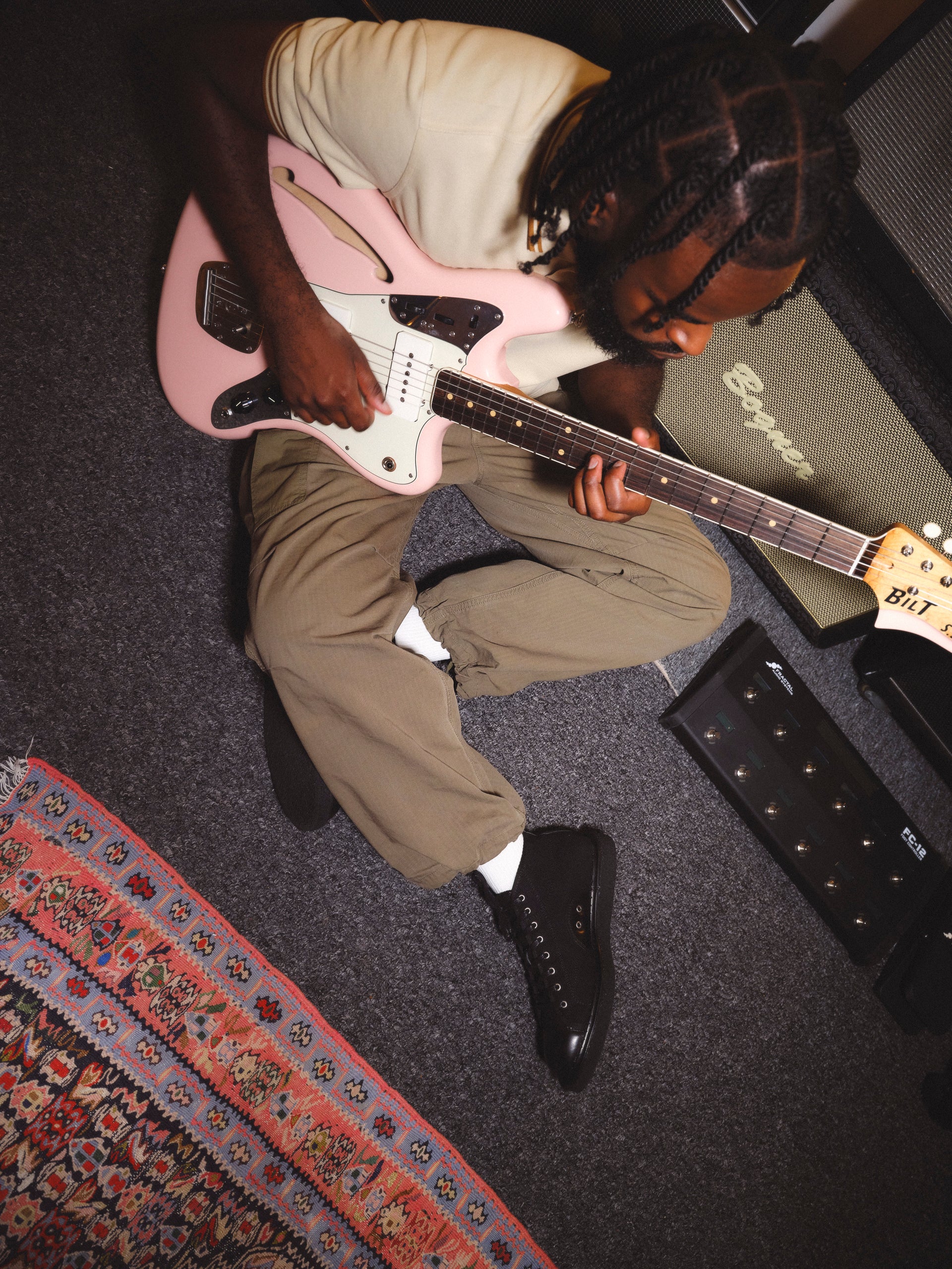 <p>Mansur wearing</p><p>the Fred Perry x George Cox Monkey Boot</p>