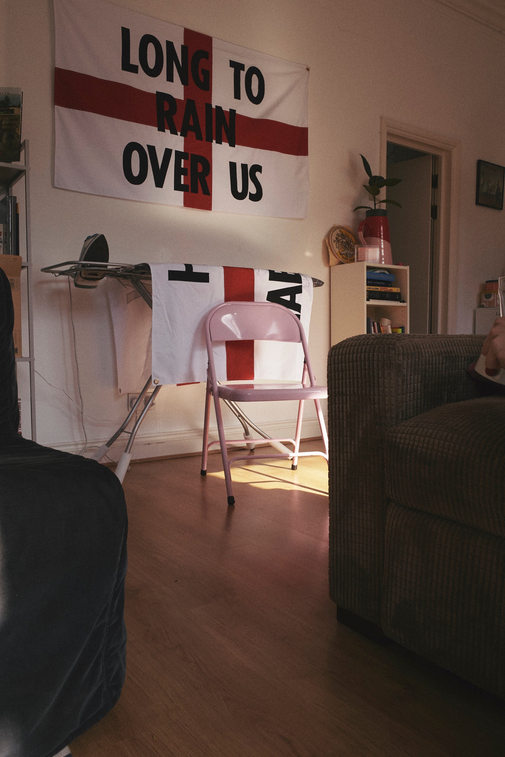 Living room of artist Corbin Shaw, decorated with his flag artwork
