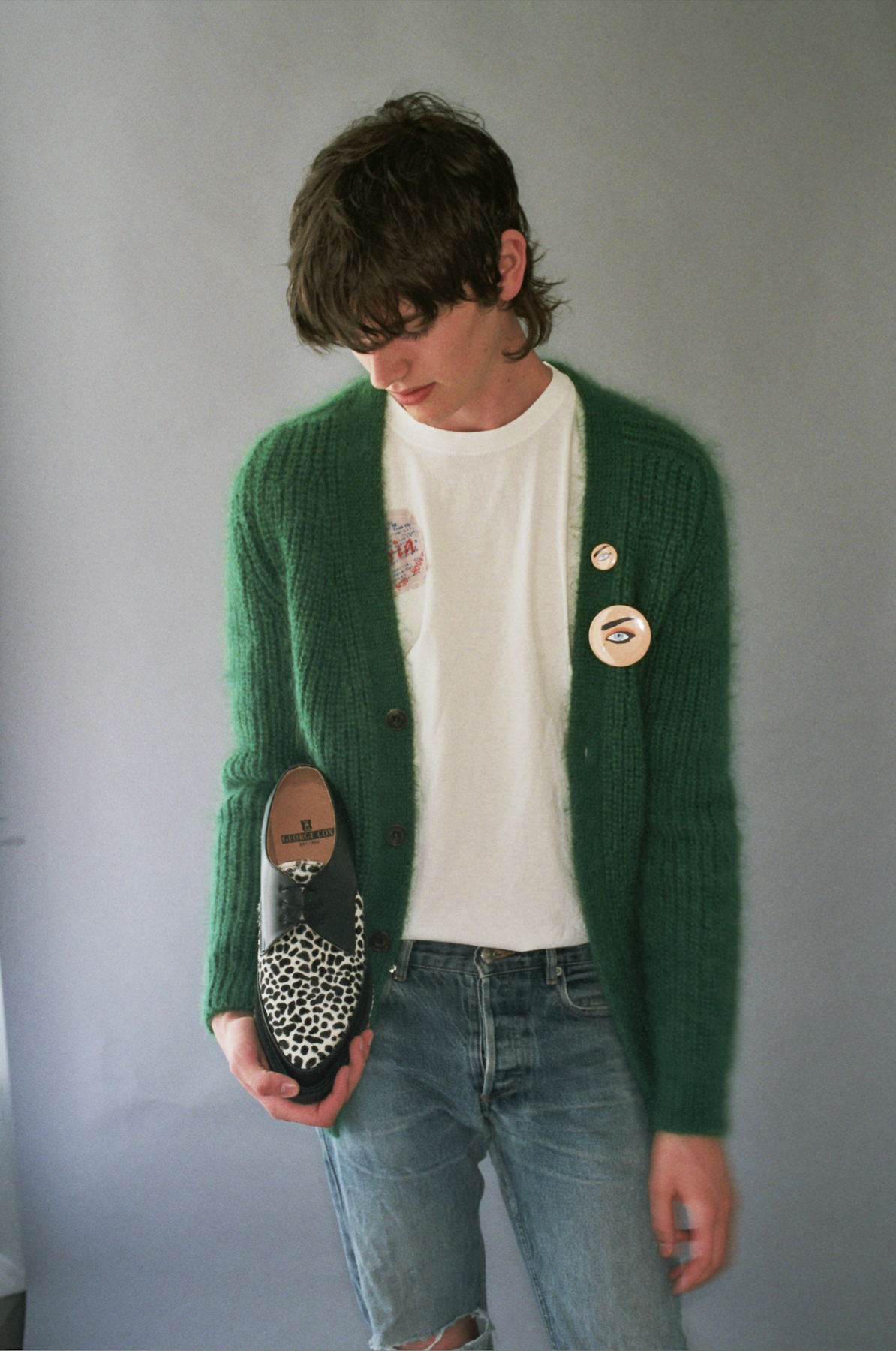 Alistair Waterfield holding black and leopard Diano Creeper