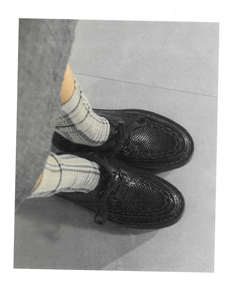 <p>The Hatton Derby, featuring a high shine snake-effect print upper and crepe sole.</p>